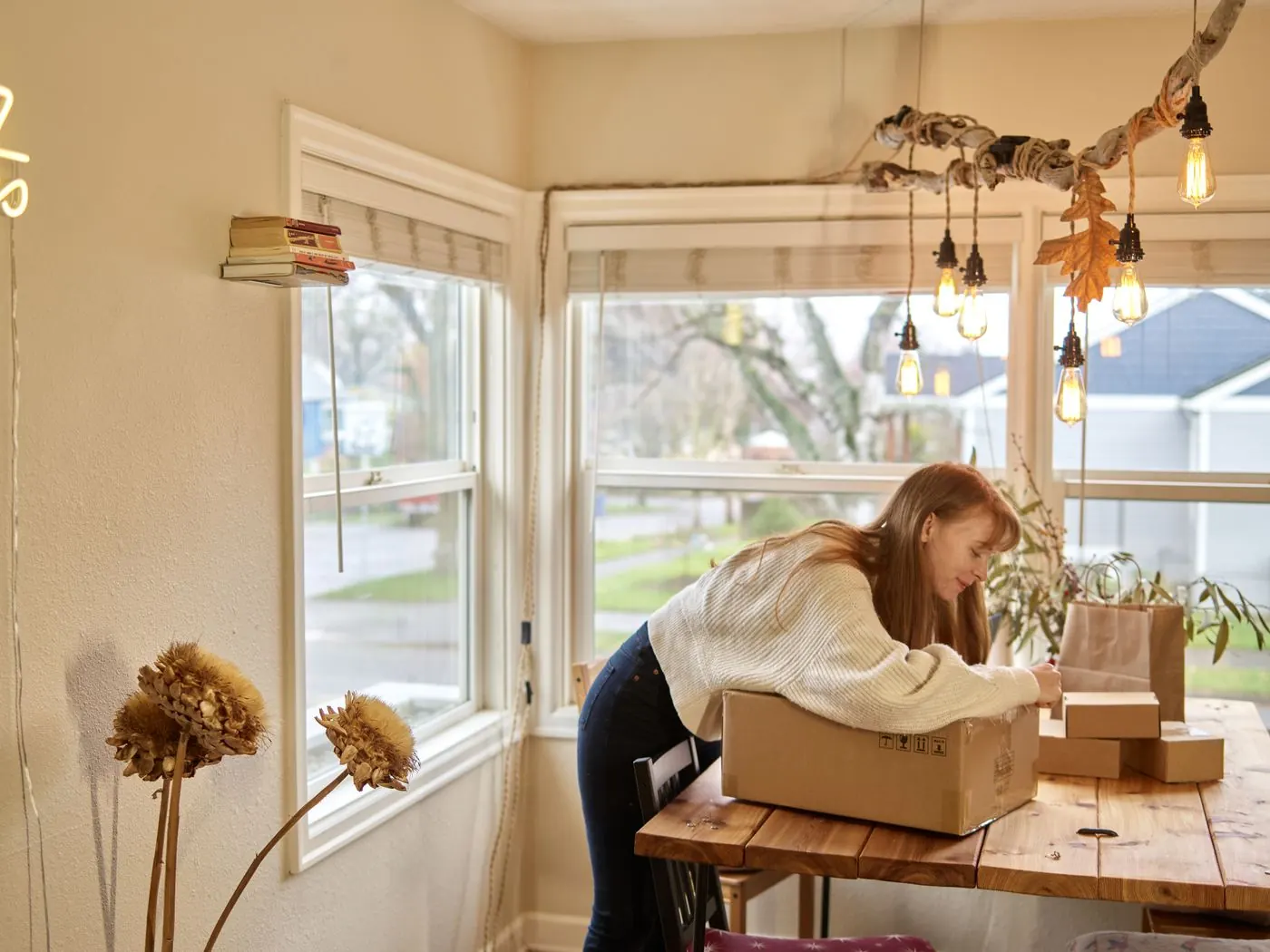 A seller packing an order into a box