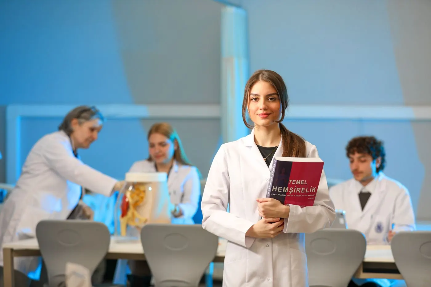 Students learning in a college lab