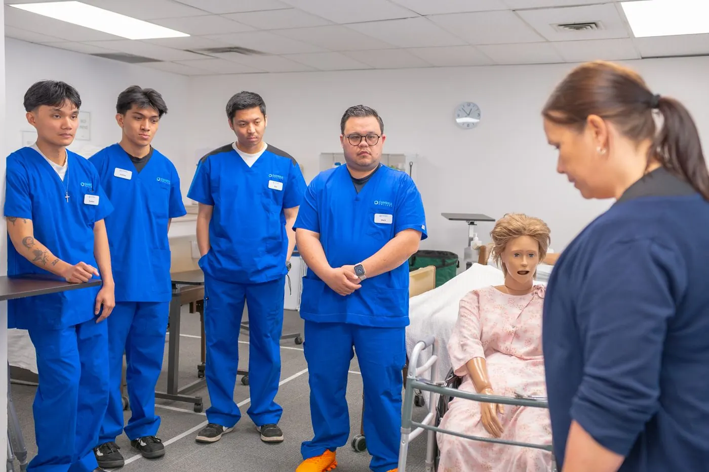 Nursing students practising patient care